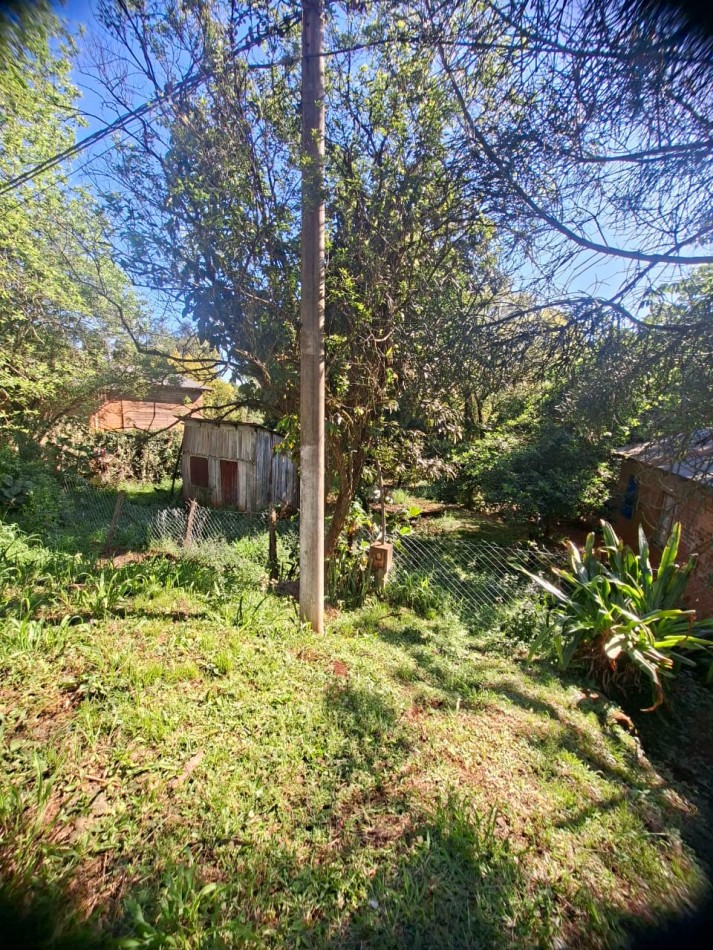 Vende Terreno con casa 